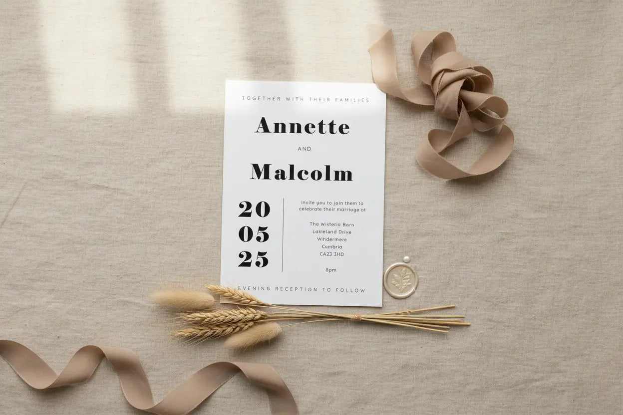 Soft oatmeal-toned wedding invitation flat lay mockup
